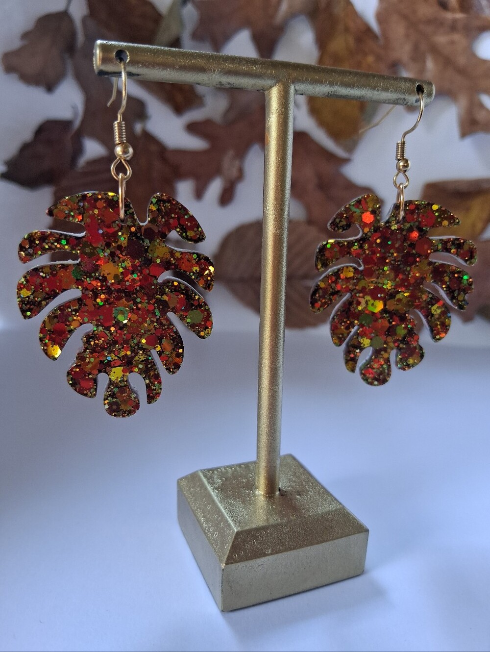 ✨ Autumn’s Fallen Spark-Hand Crafted Red and Gold Glitter Monstera Leaf Earrings